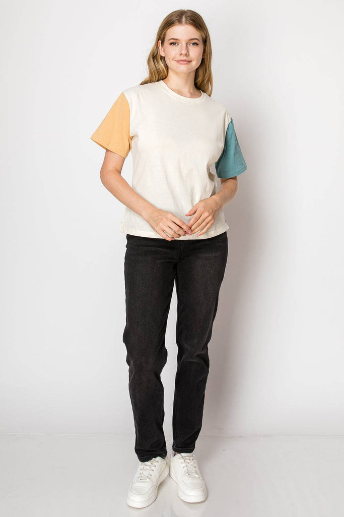 A cream color block tee designed for comfort and style, suitable for various occasions and easy to pair with other clothing.
